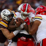 MJ Morris gets tackled.