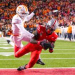 Jeremiah Smith catches a touchdown pass from Will Howard.