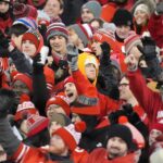 Ohio State and Tennessee fans cheer on their teams.