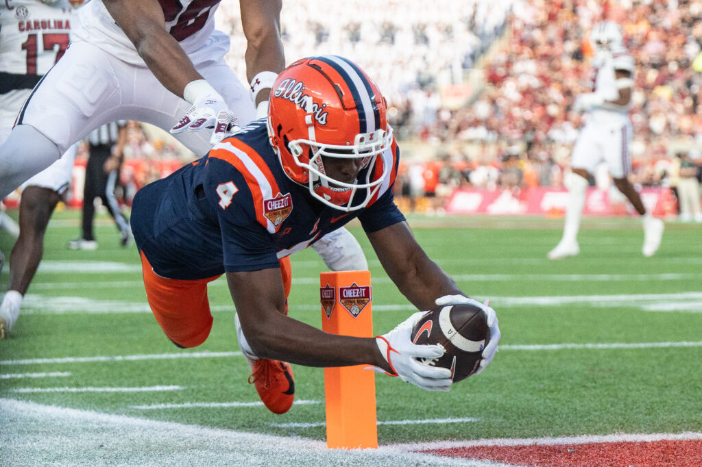 Illinois WR Zakhari Franklin dives.
