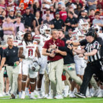Shane Beamer restrained during South Carolina's Citrus Bowl.