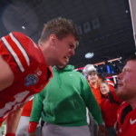 Will Howard and Jack Sawyer celebrate.