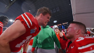 Will Howard and Jack Sawyer celebrate.