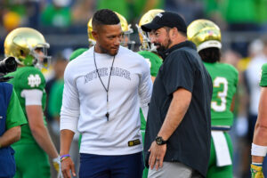 Ryan Day and Marcus Freeman talk before kickoff.
