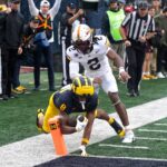 Michigan WR Tyler Morris dives