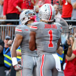 Emeka Egbuka and Quinshon Judkins after a play.