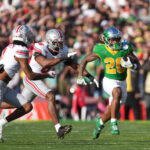 Oregon RB Jordan James runs in Rose Bowl