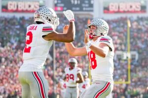 Ohio State players celebrate in Rose Bowl.