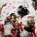 Ohio State WR Jeremiah Smith celebrates with Buckeyes.