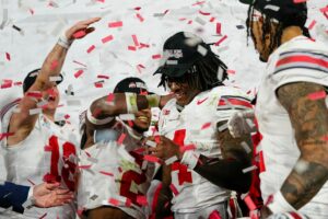 Ohio State WR Jeremiah Smith celebrates with Buckeyes.