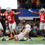 Ohio State players celebrate.