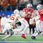 Ohio State QB Will Howard runs for a first down.