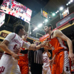 Illinois and Indiana players tussle.