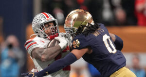 Ohio State and Notre Dame players in action.