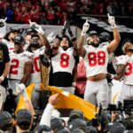 Ohio State players celebrate the title.