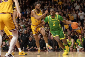 Oregon and Minnesota players in action.