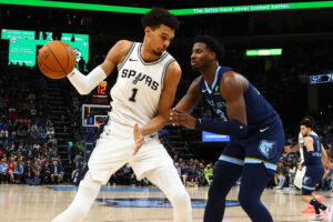 Jaren Jackson Jr. defends Victor Wembanyama in an NBA game.