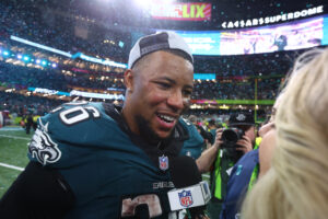 Saquon Barkley shown on field after Super Bowl.