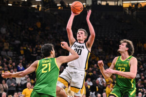 Iowa star Payton Sandfort shoots.