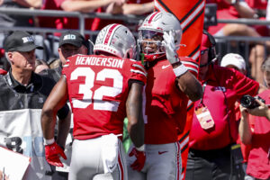 TreVeyon Henderson and Quinshon Judkins celebrate.