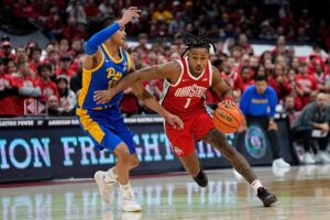 Meechie Johnson drives the ball against Pitt.