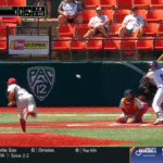 USC starter Caden Aoki punches out a batter.