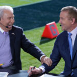 ESPN hosts Lee Corso and Kirk Herbstreit on the set of College GameDay.