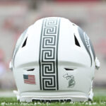 Michigan State helmet on the sidelines.
