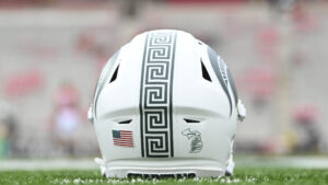 Michigan State helmet on the sidelines.