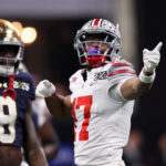 Ohio State WR Carnell Tate celebrates a grab.