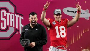 Ohio State head coach Ryan Day and Will Howard celebrate.