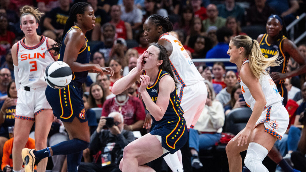 Caitlin Clark reacts to being fouled.