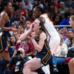 Caitlin Clark reacts to being fouled.