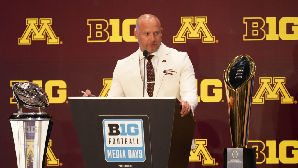 Minnesota head coach PJ Fleck at the podium.