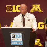 Minnesota head coach PJ Fleck at the podium.