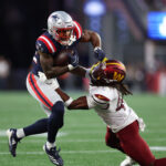 TreVeyon Henderson looks to make a play.