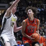 Keaton Wagler of Illinois takes on Purdue.