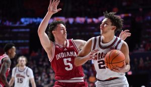 Illinois star Keaton Wagler drives against Indiana.