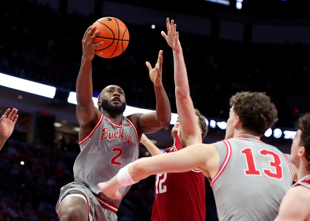 Buckeyes guard Bruce Thornton drives to the basket as Hoosiers guard Lamar Wilkerson defends