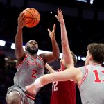 Buckeyes guard Bruce Thornton drives to the basket as Hoosiers guard Lamar Wilkerson defends