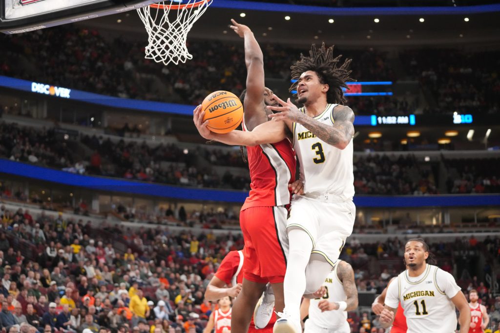 Bruce Thornton defends Michigan Wolverines guard Elliot Cadeau