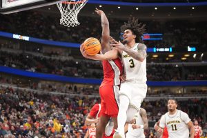 Bruce Thornton defends Michigan Wolverines guard Elliot Cadeau