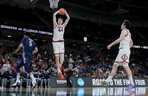 Illinois Fighting Illini center Zvonimir Ivisic dunks the ball against the Penn Quakers.
