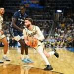 Braden Smith drives to the basket during the second half against the Queens University of Charlotte Royals.