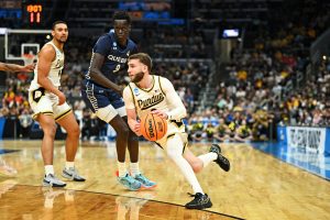 Braden Smith drives to the basket during the second half against the Queens University of Charlotte Royals.
