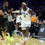 Eric Dailey Jr. dribbles the ball against the UCF Knights.