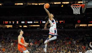 Solo Ball of UConn dunks against Illinois.