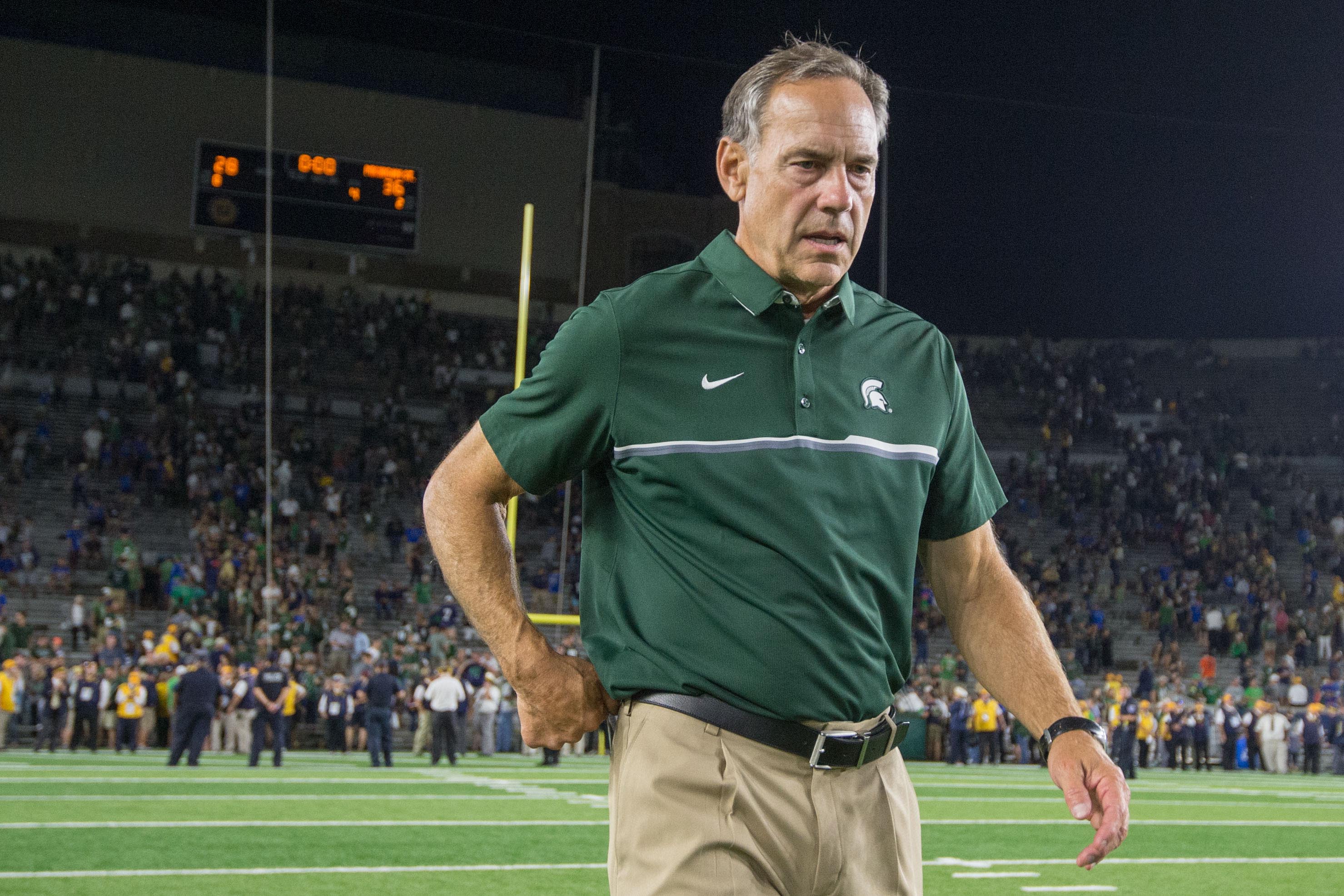 Sep 17, 2016; South Bend, IN, USA; Michigan State Spartans head coach Mark Dantonio leaves the field after MSU defeated the Notre Dame Fighting Irish 36-28 at Notre Dame Stadium. Mandatory Credit: Matt Cashore-USA TODAY Sports