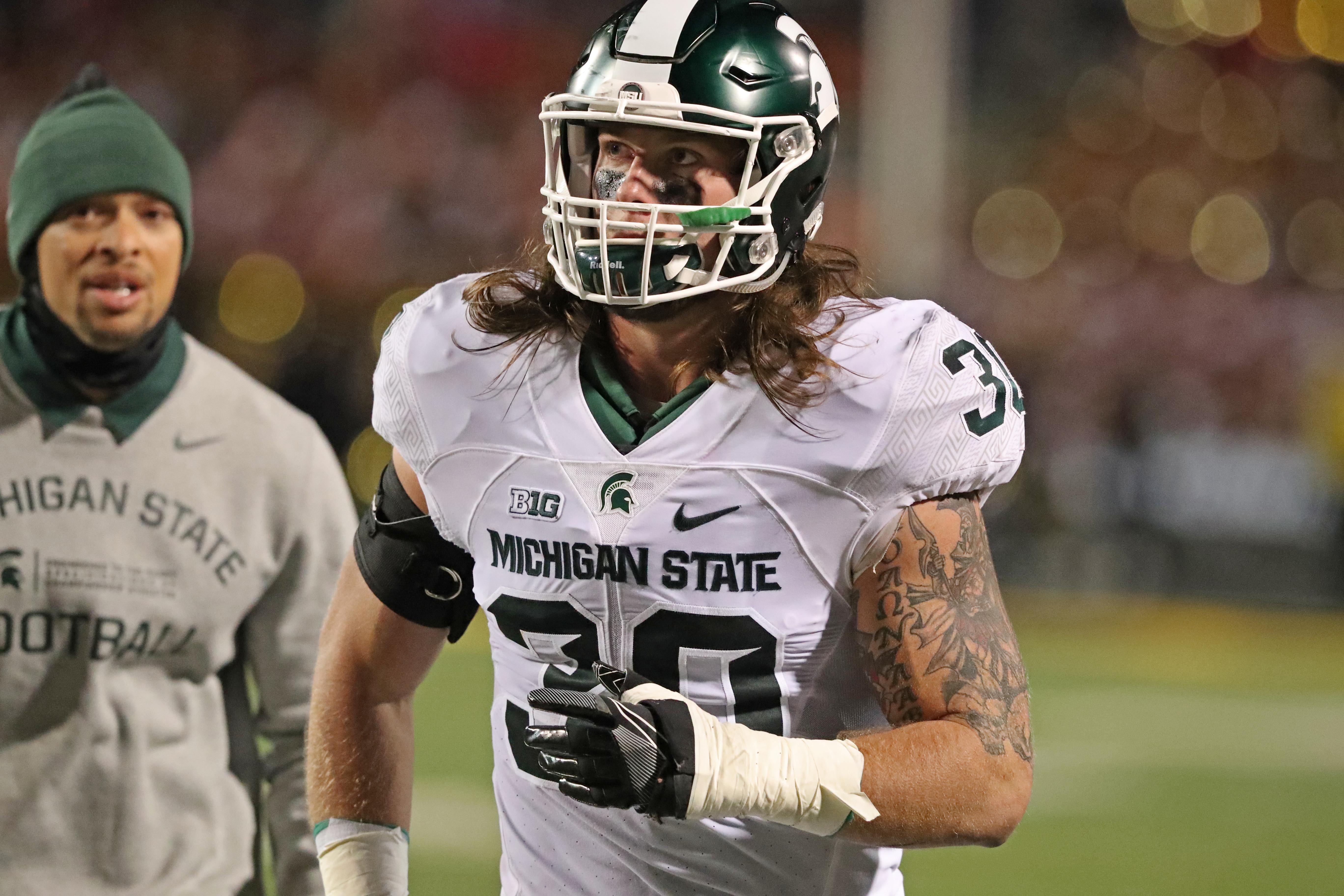 Oct 22, 2016; College Park, MD, USA; Michigan State Spartans linebacker Riley Bullough (30) is ejected from the game in the first quarter against the Maryland Terrapins at Byrd Stadium. Mandatory Credit: Mitch Stringer-USA TODAY Sports