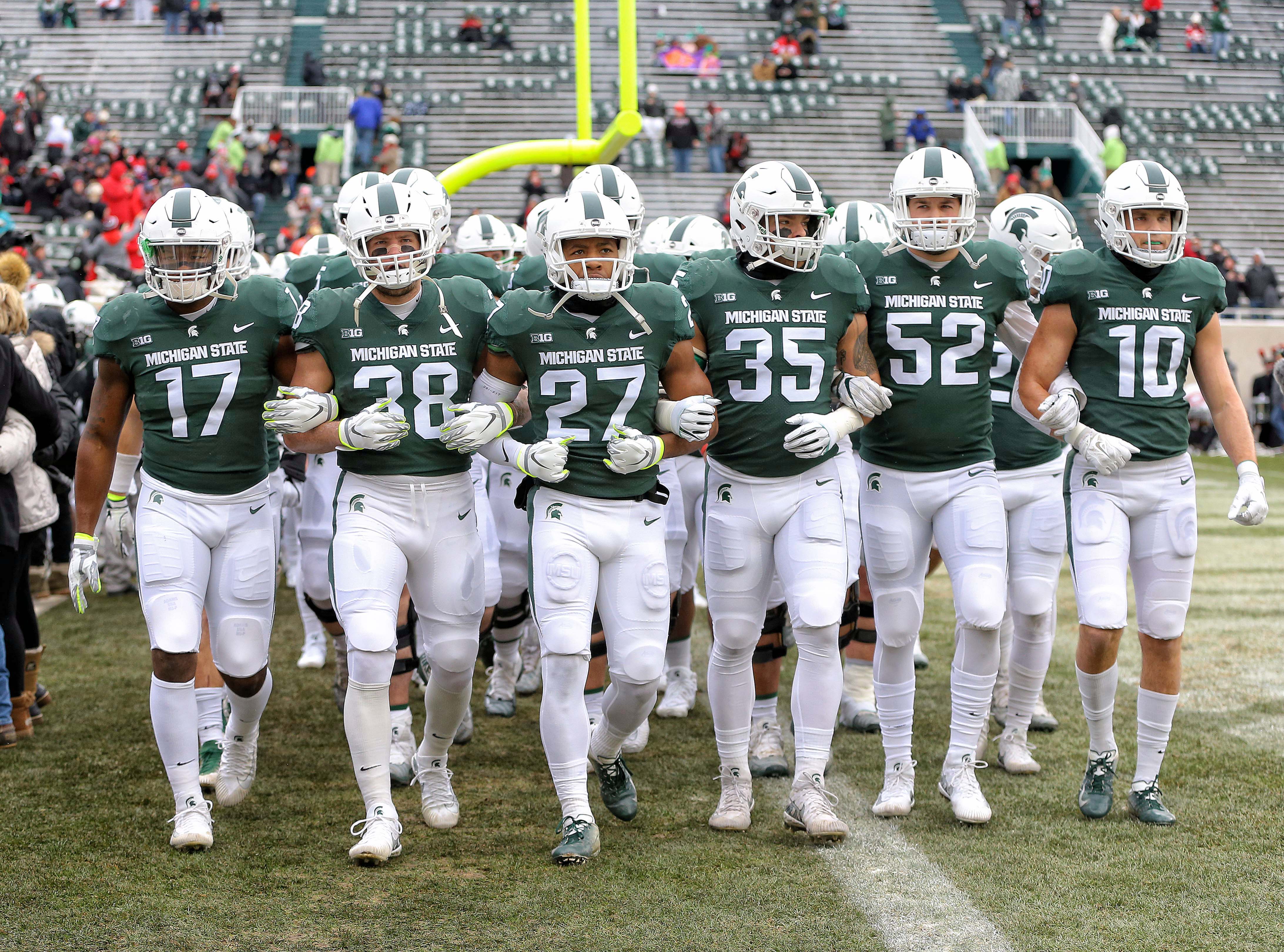 MSU football team headed to Final Four to support Spartan hoops